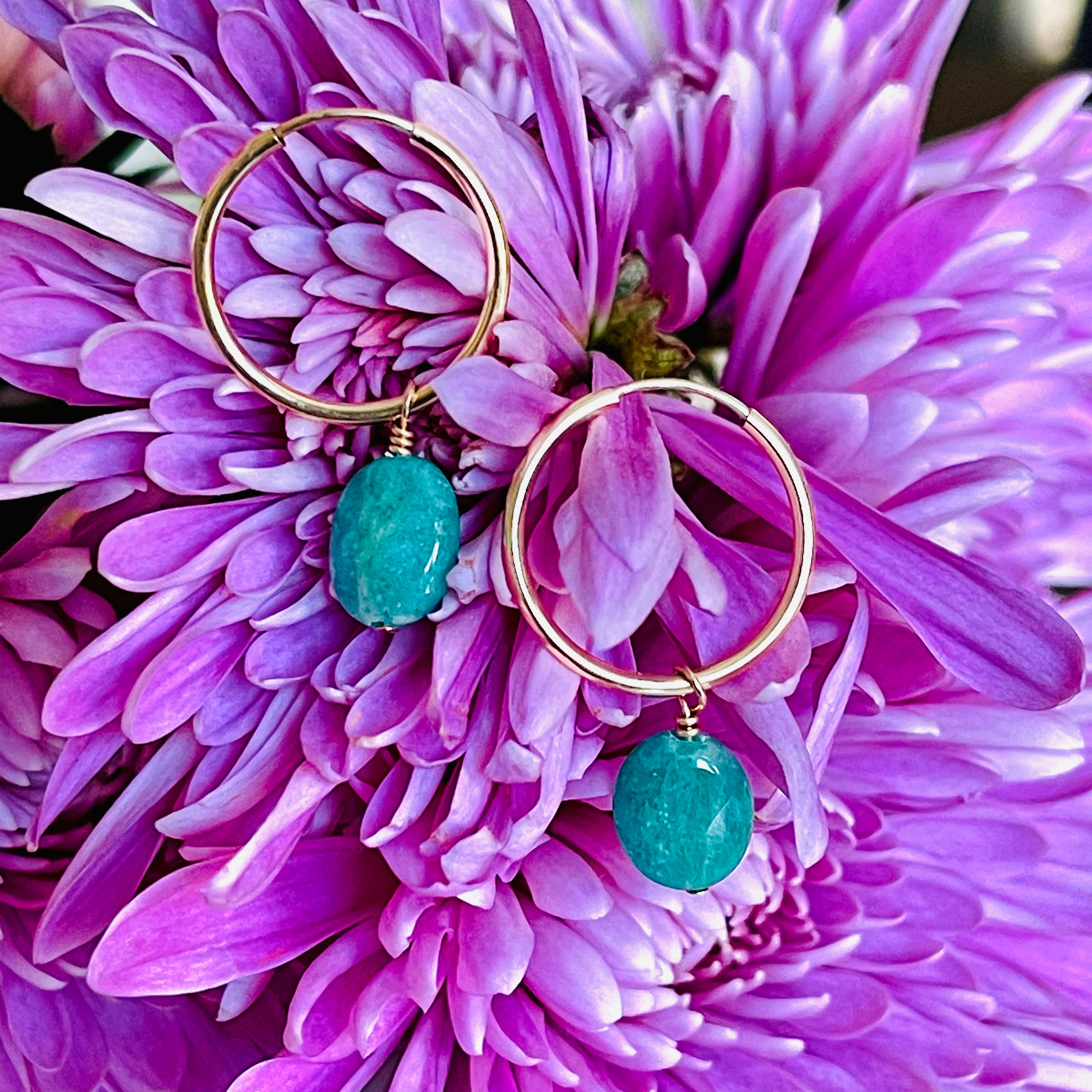 endless hoop earrings with charm