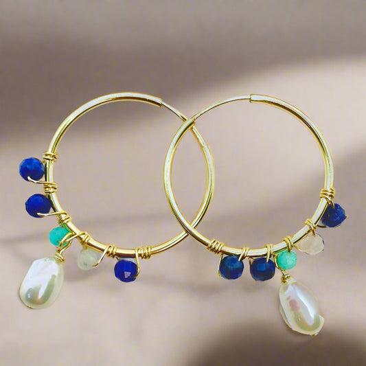 gold endless hoop with white pearl and small gemstones