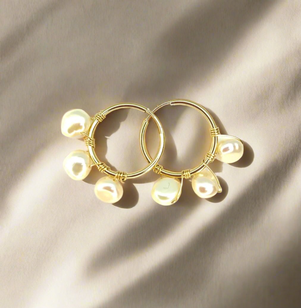 gold endless hoops with pearls