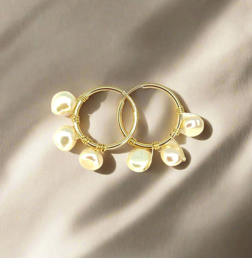 gold endless hoops with pearls