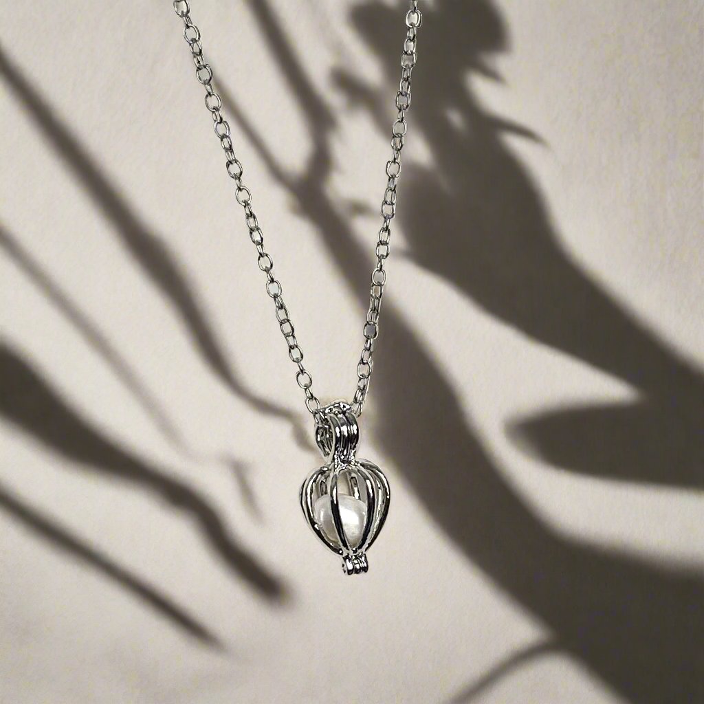 18K Gold Pearl Cage Necklace with Elegant Design