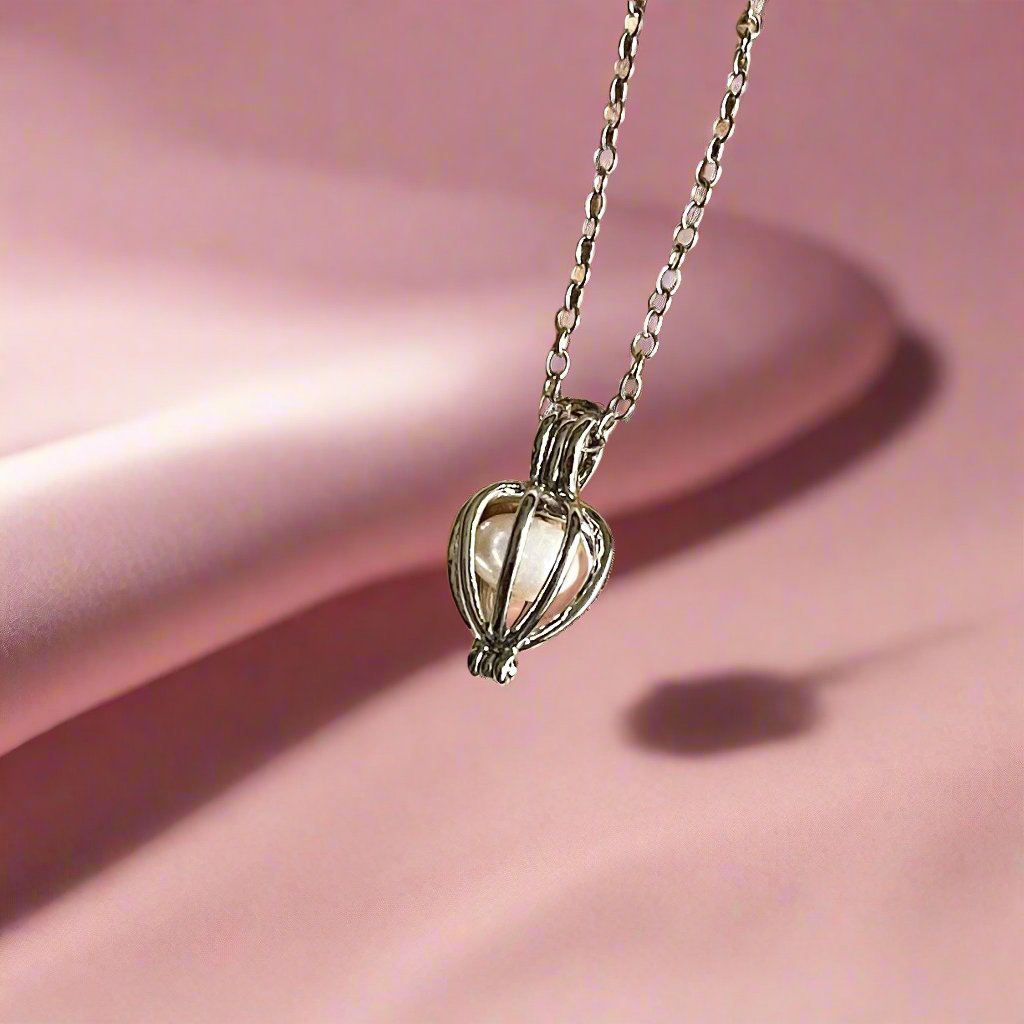 18K Gold Pearl Cage Necklace with Elegant Design