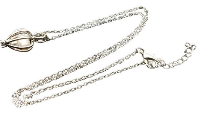 18K Gold Pearl Cage Necklace with Elegant Design
