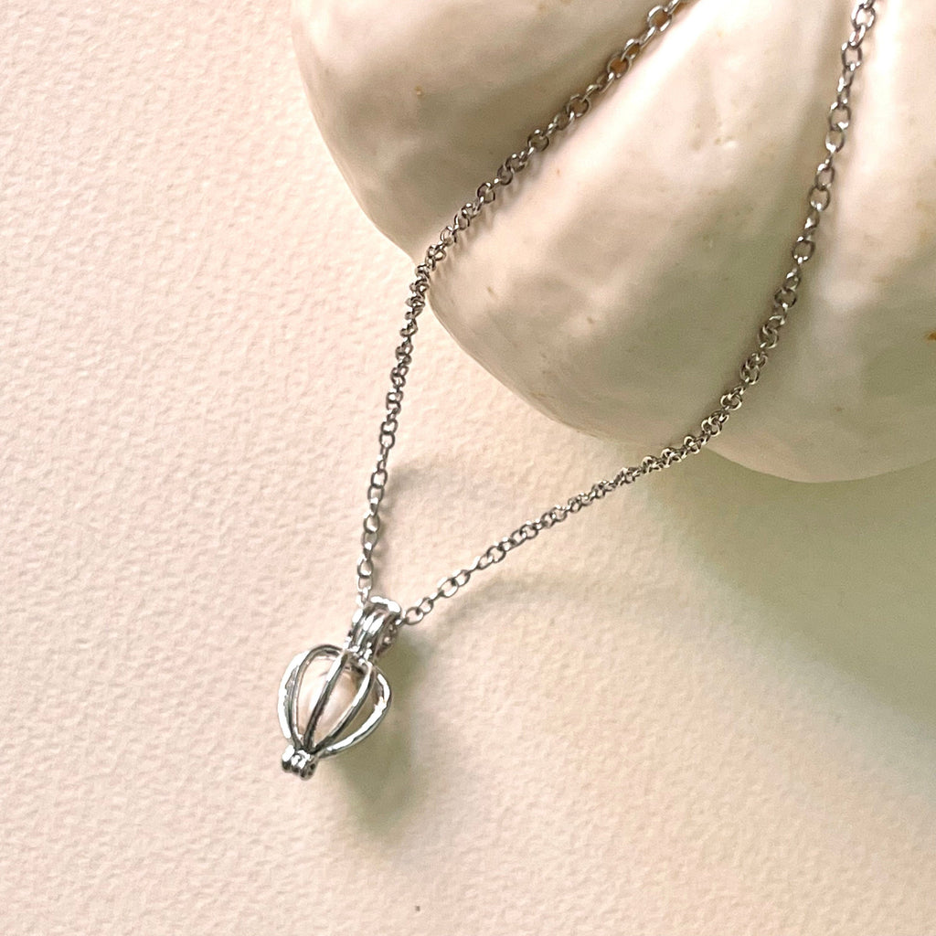 18K Gold Pearl Cage Necklace with Elegant Design
